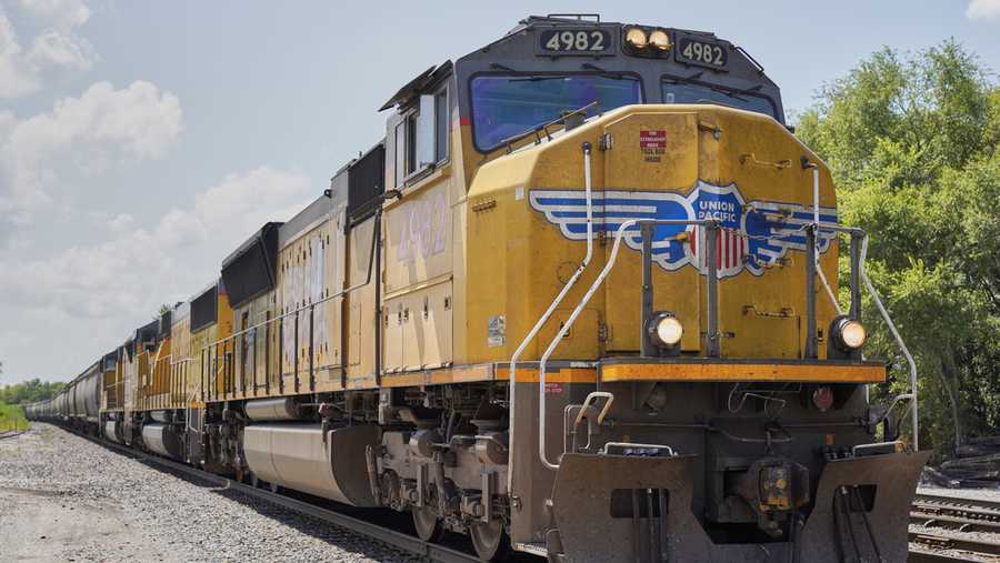FILE - A Union Pacific train travels through Union, Neb., on July 31, 2018. On Friday, June 16, 2023, the railroad industry sued to block new environmental rules in California, arguing they would force the premature retirement of about 25,000 diesel-powered locomotives across the country long before their zero-emission counterparts are ready to take their place. (AP Photo/Nati Harnik, File)