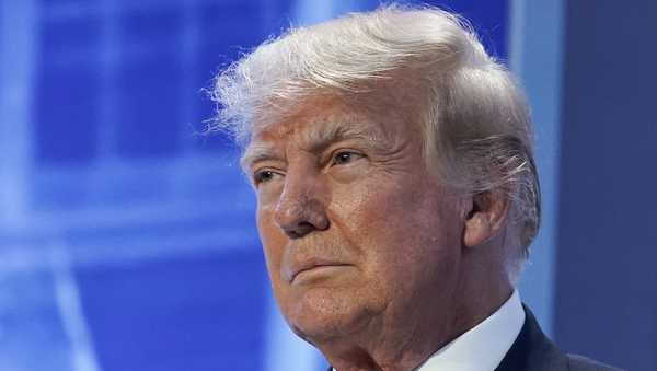 FILE - Former President Donald Trump arrives to speak at the Moms for Liberty meeting in Philadelphia, Friday, June 30, 2023. A Georgia prosecutor is expected to seek a grand jury indictment in the coming weeks in her investigation into efforts by Donald Trump and his allies to overturn the former president's 2020 election loss. Fulton County District Attorney Fani Willis began investigating more than two years ago, shortly after a recording was released of a January 2021 phone call Trump made to Georgia's secretary of state. (AP Photo/Matt Rourke, File)