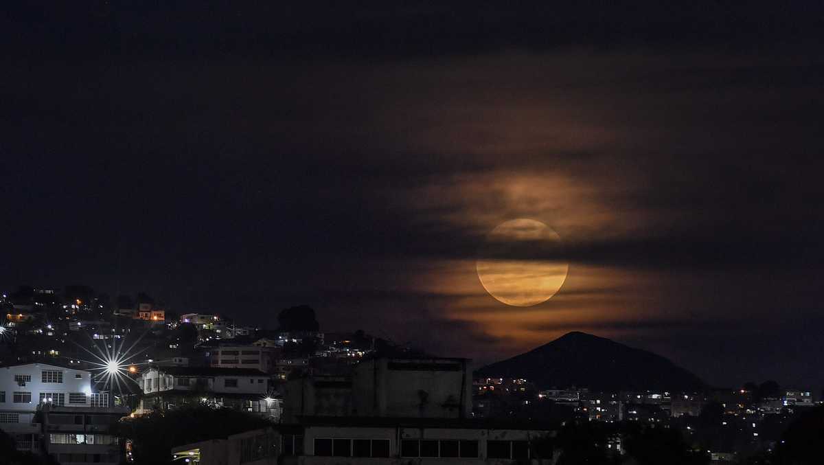 PHOTOS The first supermoon in August rises around the world