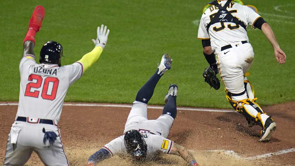 Pirates score 6 in 3rd to chase Strider and then hold off the Braves 7-6  after rain delay