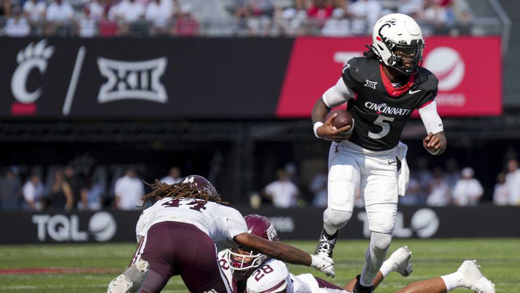 Emory Jones accounts for 7 touchdowns, leads Cincinnati in a 66-13 rout of Eastern Kentucky