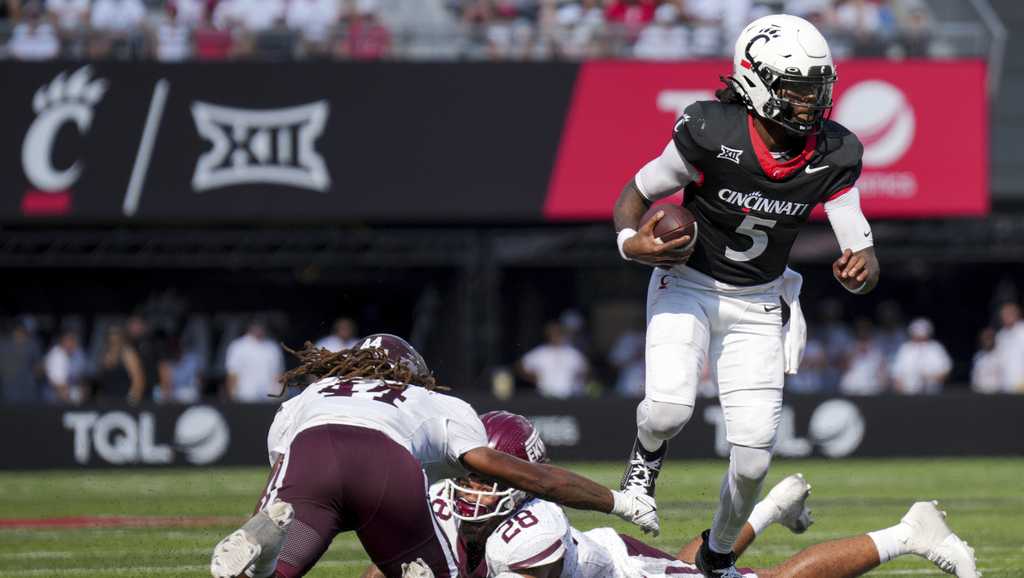 Emory Jones accounts for 7 touchdowns, leads Cincinnati in a 66-13 rout of Eastern Kentucky
