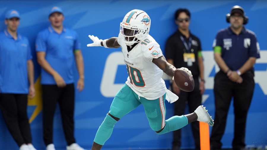 Hill, Tagovailoa too much for Chargers as Dolphins open with 36-34 victory