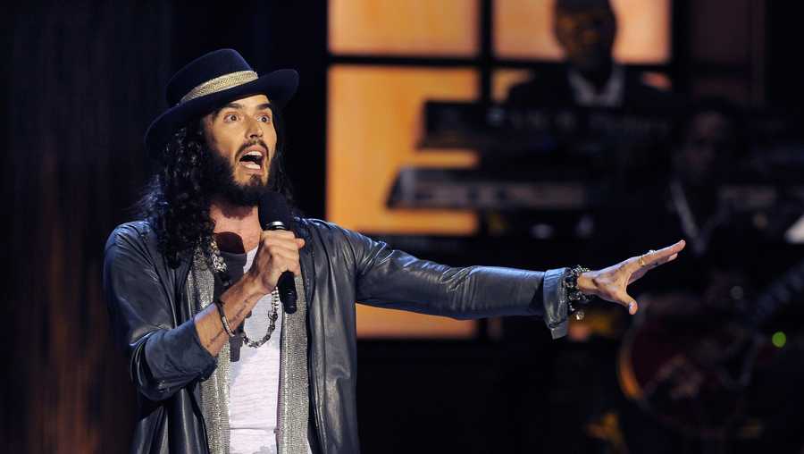 FILE - Comedian Russell Brand performs at "Eddie Murphy: One Night Only," a celebration of Murphy's career, at the Saban Theater in Beverly Hills, Calif, Nov. 3, 2012. Three British news organizations are on Saturday, Sept. 16, 2023 reporting that comedian and social influencer Russell Brand has been accused of rape, sexual assault and abuse based on allegations from four women who knew him over a seven-year period at the height of his fame. (Photo by Chris Pizzello/Invision/AP, File)