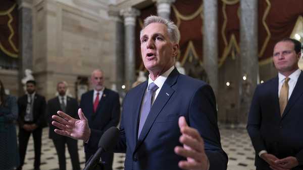 FILE - House Speaker Kevin McCarthy, R-Calif., joined by Rep. August Pfluger, R-Texas, right, and other GOP members, talks to reporters just after voting to advance appropriations bills on the House floor, at the Capitol in Washington, Tuesday night, Sept. 26, 2023. McCarthy is digging in on his refusal to take up Senate legislation designed to keep the federal government fully running beyond midnight Saturday, Sept. 30. (AP Photo/J. Scott Applewhite, File)