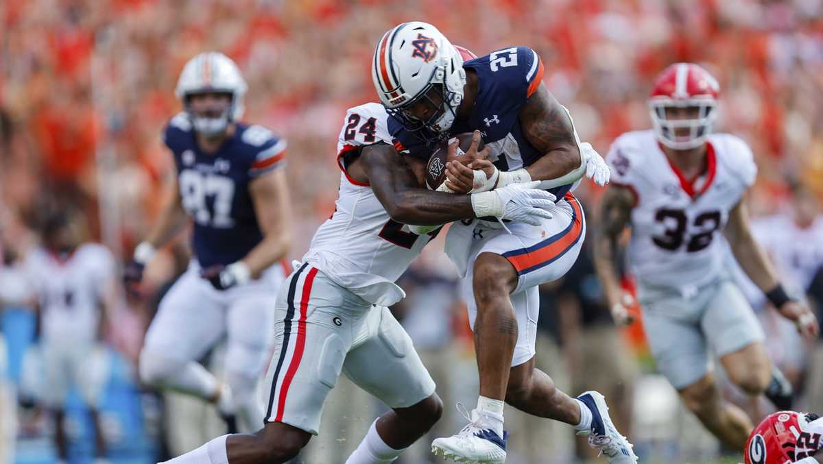 Beck-to-Bowers combo rallies No. 1 Georgia to 27-20 win over Auburn