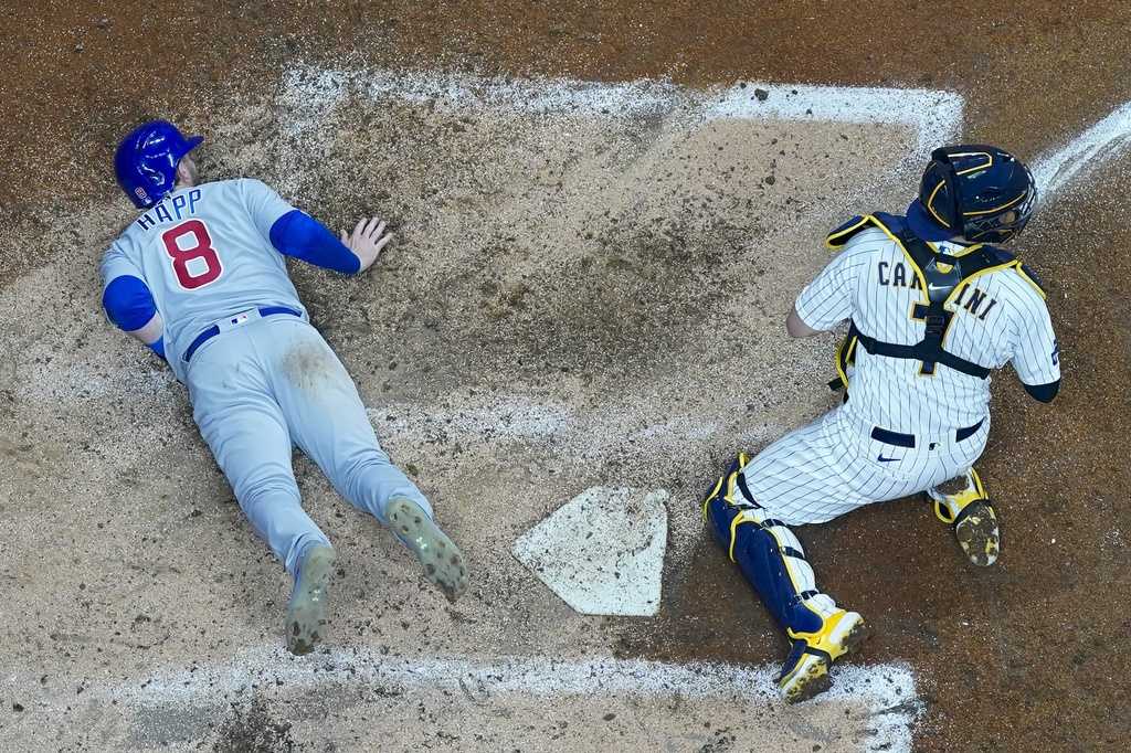 Cubs beat Brewers Marlins eliminate Cubs from playoffs