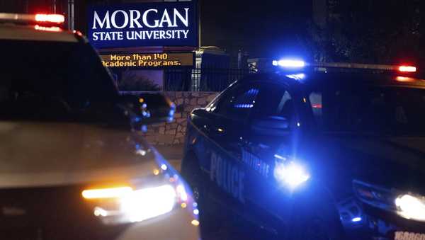 Police block off the entrance to Morgan State University as they respond to a shooting Tuesday, Oct. 3, 2023, in Baltimore. (AP Photo/Julia Nikhinson)