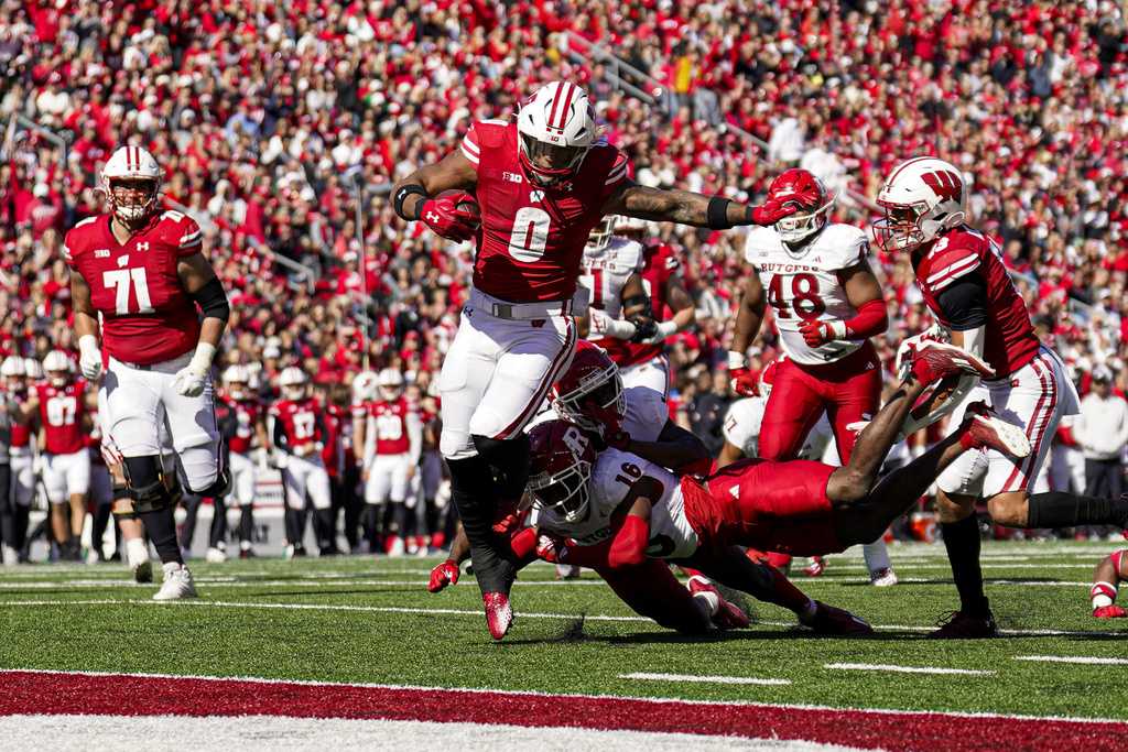 Wearing Pewaukee cleats, J.J. Watt records a sack for Arizona