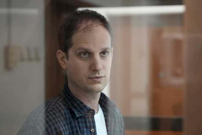 Wall Street Journal reporter Evan Gershkovich stands in a glass cage in a courtroom at the Moscow City Court in Moscow, Russia, Tuesday, Oct. 10, 2023. Wall Street Journal reporter Evan Gershkovich stands in a glass cage in a courtroom at the Moscow City Court in Moscow, Russia, Tuesday, Oct. 10, 2023. A Russian court on Tuesday is scheduled to hear a defense appeal of Wall Street Journal reporter Evan Gershkovich against the decision to extend his period of detention. (AP Photo/Alexander Zemlianichenko)