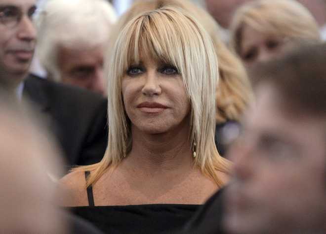 FILE&#x20;-&#x20;Suzanne&#x20;Somers&#x20;is&#x20;seen&#x20;during&#x20;the&#x20;funeral&#x20;services&#x20;for&#x20;Merv&#x20;Griffin&#x20;at&#x20;the&#x20;Church&#x20;of&#x20;the&#x20;Good&#x20;Shepherd&#x20;in&#x20;Beverly&#x20;Hills,&#x20;Calif.,&#x20;Aug.&#x20;17,&#x20;2007.&#x20;Somers,&#x20;the&#x20;effervescent&#x20;blonde&#x20;actor&#x20;known&#x20;for&#x20;playing&#x20;Chrissy&#x20;Snow&#x20;on&#x20;the&#x20;television&#x20;show&#x20;&#x201C;Three&#x2019;s&#x20;Company,&#x201D;&#x20;as&#x20;well&#x20;as&#x20;her&#x20;business&#x20;endeavors,&#x20;died&#x20;early&#x20;Sunday,&#x20;Oct.&#x20;15,&#x20;2023,&#x20;her&#x20;family&#x20;said&#x20;in&#x20;a&#x20;statement&#x20;provided&#x20;by&#x20;her&#x20;longtime&#x20;publicist&#x20;R.&#x20;Couri&#x20;Hay.&#x20;She&#x20;was&#x20;76.&#x20;&#x28;AP&#x20;Photo&#x2F;Kevork&#x20;Djansezian,&#x20;Pool,&#x20;File&#x29;