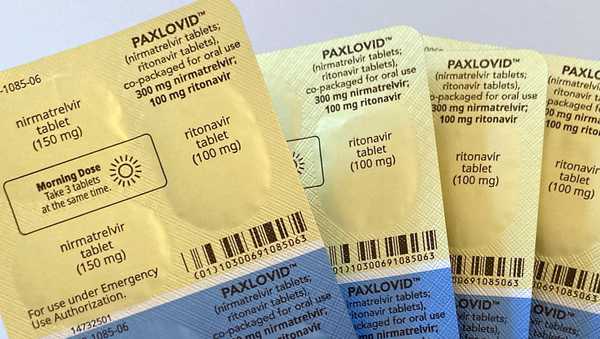 FILE - Doses of the anti-viral drug Paxlovid are displayed in New York, Aug. 1, 2022. The COVID-19 treatments millions of have taken for free from the federal government will enter the private market next week with a hefty price tag. Pharmaceutical giant Pfizer is setting the price for a five-day treatment of Paxlovid at $1,390, but Americans can still access the pills at no cost, for now. Millions of free, taxpayer-funded courses of the pills will remain at pharmacies, hospitals and doctor's offices across the country, U.S. Health and Human Services officials said Friday, Oct. 27, 2023. (AP Photo/Stephanie Nano, File)