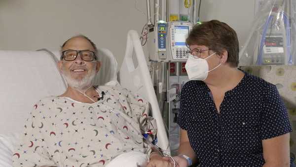 In this photo provided by the University of Maryland School of Medicine, Lawrence Faucette sits with wife, Ann, in the school's hospital in Baltimore, Md., in September 2023, before receiving a pig heart transplant. Lawrence Faucette, the second person to receive a transplanted heart from a pig has died, nearly six weeks after the highly experimental surgery, his doctors announced Tuesday, Oct. 31, 2023. (Mark Teske/University of Maryland School of Medicine via AP, File)