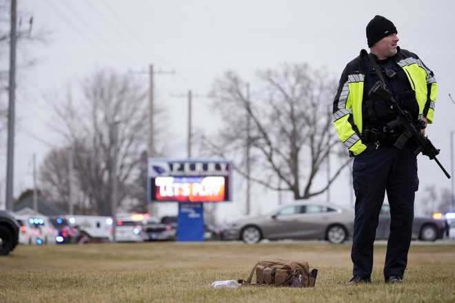 Police&#x20;respond&#x20;to&#x20;Perry&#x20;High&#x20;School&#x20;in&#x20;Perry,&#x20;Iowa.,&#x20;Thursday,&#x20;Jan.&#x20;4,&#x20;2024.&#x20;Police&#x20;say&#x20;there&#x20;has&#x20;been&#x20;a&#x20;shooting&#x20;at&#x20;the&#x20;city&amp;apos&#x3B;s&#x20;high&#x20;school.&#x28;AP&#x20;Photo&#x2F;Andrew&#x20;Harnik&#x29;