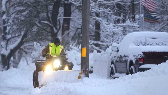 A major winter storm bringing up to a foot of snow and freezing rain to some communities spread across New England, sending residents scurrying to pull out their shovels and snowblowers to clear sidewalks and driveways - Vimarsana News