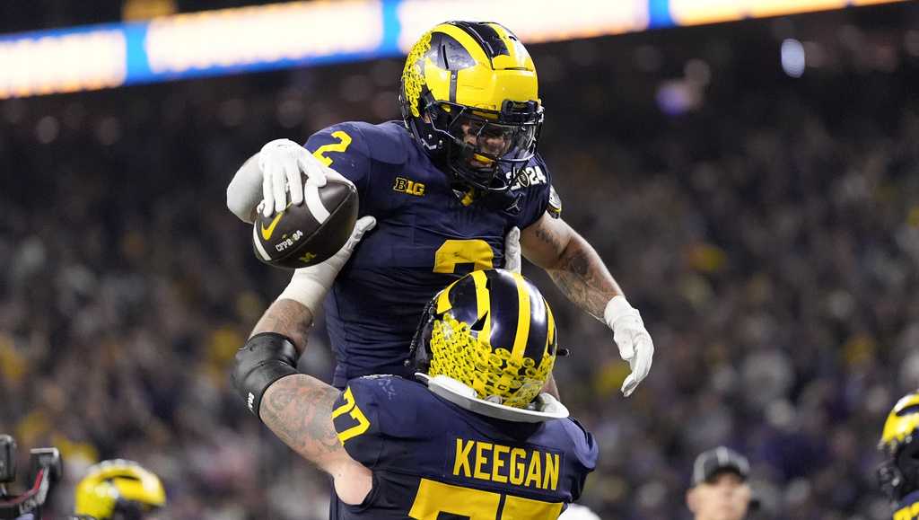 Michigan Wolverines win college football's national championship against  Washington Huskies