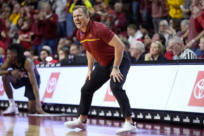 Iowa&#x20;State&#x20;head&#x20;coach&#x20;T.J.&#x20;Otzelberger&#x20;reacts&#x20;during&#x20;the&#x20;first&#x20;half&#x20;of&#x20;an&#x20;NCAA&#x20;college&#x20;basketball&#x20;game&#x20;against&#x20;Houston,&#x20;Tuesday,&#x20;Jan.&#x20;9,&#x20;2024,&#x20;in&#x20;Ames,&#x20;Iowa.&#x20;&#x28;AP&#x20;Photo&#x2F;Charlie&#x20;Neibergall&#x29;