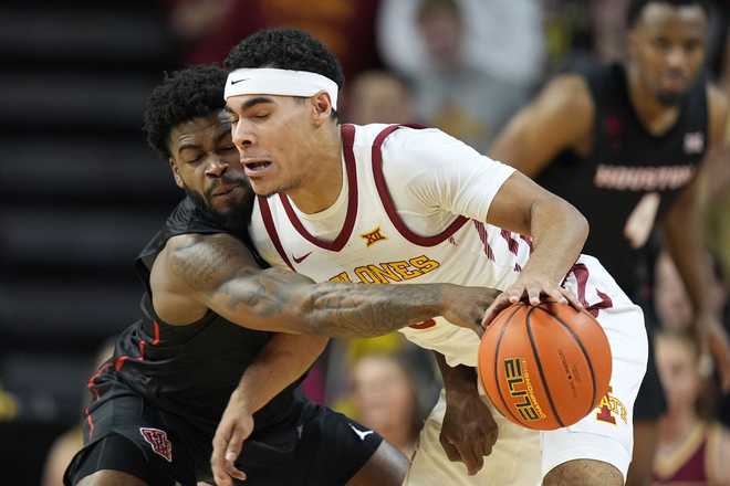 Houston&#x20;guard&#x20;Jamal&#x20;Shead,&#x20;left,&#x20;tries&#x20;to&#x20;steal&#x20;the&#x20;ball&#x20;from&#x20;Iowa&#x20;State&#x20;guard&#x20;Tamin&#x20;Lipsey&#x20;during&#x20;the&#x20;first&#x20;half&#x20;of&#x20;an&#x20;NCAA&#x20;college&#x20;basketball&#x20;game,&#x20;Tuesday,&#x20;Jan.&#x20;9,&#x20;2024,&#x20;in&#x20;Ames,&#x20;Iowa.&#x20;&#x28;AP&#x20;Photo&#x2F;Charlie&#x20;Neibergall&#x29;