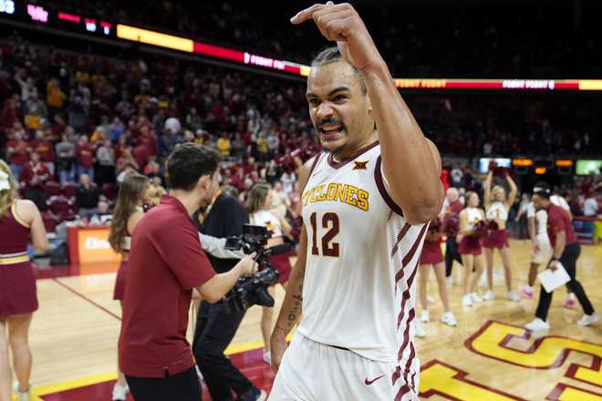 Iowa&#x20;State&#x20;forward&#x20;Robert&#x20;Jones&#x20;&#x28;12&#x29;&#x20;walks&#x20;off&#x20;the&#x20;court&#x20;after&#x20;an&#x20;NCAA&#x20;college&#x20;basketball&#x20;game&#x20;against&#x20;Houston,&#x20;Tuesday,&#x20;Jan.&#x20;9,&#x20;2024,&#x20;in&#x20;Ames,&#x20;Iowa.&#x20;Iowa&#x20;State&#x20;won&#x20;57-53.&#x20;&#x28;AP&#x20;Photo&#x2F;Charlie&#x20;Neibergall&#x29;