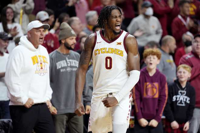 Iowa&#x20;State&#x20;forward&#x20;Tre&#x20;King&#x20;celebrates&#x20;at&#x20;the&#x20;end&#x20;of&#x20;an&#x20;NCAA&#x20;college&#x20;basketball&#x20;game&#x20;against&#x20;Houston,&#x20;Tuesday,&#x20;Jan.&#x20;9,&#x20;2024,&#x20;in&#x20;Ames,&#x20;Iowa.&#x20;Iowa&#x20;State&#x20;won&#x20;57-53.&#x20;&#x28;AP&#x20;Photo&#x2F;Charlie&#x20;Neibergall&#x29;
