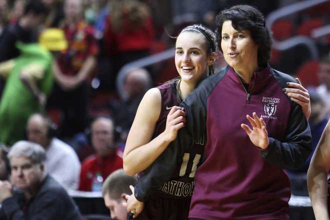 This&#x20;photo&#x20;provided&#x20;by&#x20;Dowling&#x20;Catholic&#x20;High&#x20;School&#x20;shows&#x20;basketball&#x20;player&#x20;Caitlin&#x20;Clark&#x20;with&#x20;head&#x20;coach&#x20;Kristin&#x20;Meyer&#x20;at&#x20;the&#x20;girls&#x20;state&#x20;tournament&#x20;at&#x20;Wells&#x20;Fargo&#x20;Arena&#x20;in&#x20;Des&#x20;Moines,&#x20;Iowa,&#x20;&#x20;Feb.&#x20;25,&#x20;2020.&#x20;Clark&#x20;is&#x20;now&#x20;on&#x20;the&#x20;cusp&#x20;of&#x20;becoming&#x20;Division&#x20;I&#x20;women&amp;apos&#x3B;s&#x20;basketball&amp;apos&#x3B;s&#x20;all-time&#x20;leading&#x20;scorer.&#x20;An&#x20;early&#x20;sign&#x20;of&#x20;how&#x20;her&#x20;career&#x20;would&#x20;evolve&#x20;happened&#x20;when&#x20;she&#x20;was&#x20;a&#x20;high&#x20;school&#x20;junior.&#x20;In&#x20;a&#x20;game&#x20;against&#x20;Mason&#x20;City&#x20;she&#x20;scored&#x20;60&#x20;points&#x20;and&#x20;made&#x20;13&#x20;3-pointers&#x20;on&#x20;17&#x20;attempts.&#x00A0;&#x28;Earl&#x20;Hulst&#x2F;Dowling&#x20;High&#x20;School&#x20;via&#x20;AP&#x29;