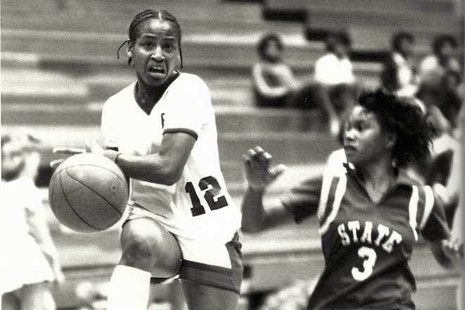 This&#x20;undated&#x20;photo&#x20;provided&#x20;by&#x20;Francis&#x20;Marion&#x20;University&#x20;shows&#x20;women&amp;apos&#x3B;s&#x20;basketball&#x20;player&#x20;Pearl&#x20;Moore,&#x20;left,&#x20;during&#x20;a&#x20;basketball&#x20;game&#x20;against&#x20;South&#x20;Carolina&#x20;State.&#x20;Long&#x20;before&#x20;Iowa&#x20;star&#x20;Caitlin&#x20;Clark&#x20;hit&#x20;her&#x20;first&#x20;long-range&#x20;three&#x20;or&#x20;signed&#x20;her&#x20;first&#x20;autograph,&#x20;Hall&#x20;of&#x20;Famer&#x20;Pearl&#x20;Moore&#x20;had&#x20;already&#x20;set&#x20;the&#x20;scoring&#x20;standard&#x20;for&#x20;women&amp;apos&#x3B;s&#x20;basketball.&#x20;Moore&#x20;began&#x20;her&#x20;journey&#x20;as&#x20;the&#x20;game&amp;apos&#x3B;s&#x20;greatest&#x20;female&#x20;scorer&#x20;in&#x20;an&#x20;era&#x20;when&#x20;women&#x20;were&#x20;not&#x20;encouraged&#x20;to&#x20;play&#x20;sports.&#x20;&#x28;Francis&#x20;Marion&#x20;University&#x20;via&#x20;AP&#x29;