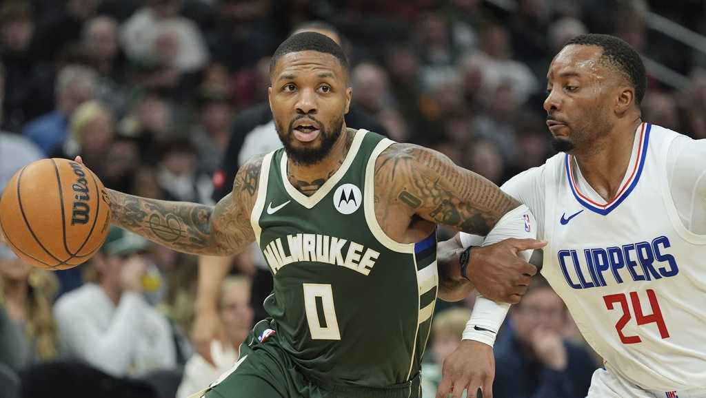 Damian Lillard scores 41 points to lead the Milwaukee Bucks to