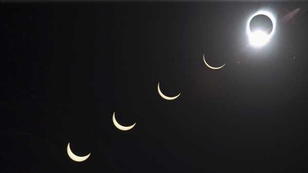 FILE - The progression of a total solar eclipse is seen in a multiple exposure photograph taken in 5-minute intervals, with the moon passing in front of the sun above Siem Reap in northwestern Cambodia, 225 kilometers (140 miles) from Phnom Penh, on Tuesday, Oct. 24, 1995. (AP Photo/Richard Vogel, File)