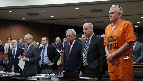 Alex Murdaugh, convicted of killing his wife, Maggie, and younger son, Paul, in June 2021, stands with his defense team during a hearing on a motion for a retrial, Jan. 16, 2024, at the Richland County Judicial Center in Columbia, S.C. Murdaugh is scheduled to be sentenced Monday, April 1, 2024 on financial crime charges. It's likely the last time he will face a judge for punishment. (Tracy Glantz/The State via AP, Pool)