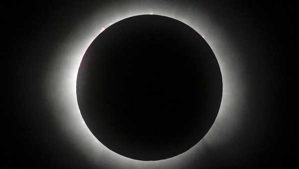 The moon covers the sun during a total solar eclipse, as seen from Mazatlan, Mexico, Monday, April 8, 2024. (AP Photo/Fernando Llano)