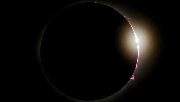 The moon partially covers the sun during a total solar eclipse in Mazatlan, Mexico, Monday, April 8, 2024. (AP Photo/Fernando Llano)