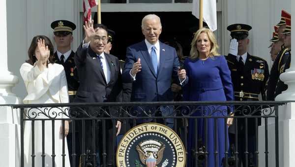 President Joe Biden, center right, and first lady Jill Biden, right, wave with Japanese Prime Minister Fumio Kishida, center left, and his wife Yuko Kishida, left, during a State Arrival Ceremony on the South Lawn of the White House, Wednesday, April 10, 2024, in Washington. (AP Photo/Susan Walsh)