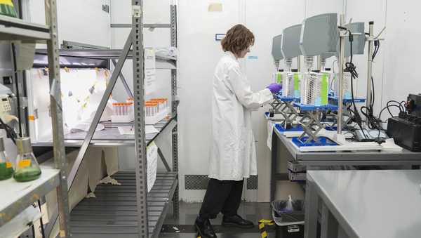 Brooke Gray prepares to take a sample while doing research on PFAS removal from water, Wednesday, April 10, 2024, at a U.S. Environmental Protection Agency lab in Cincinnati. The Environmental Protection Agency on Wednesday announced its first-ever limits for several common types of PFAS, the so-called "forever chemicals," in drinking water. (AP Photo/Joshua A. Bickel)