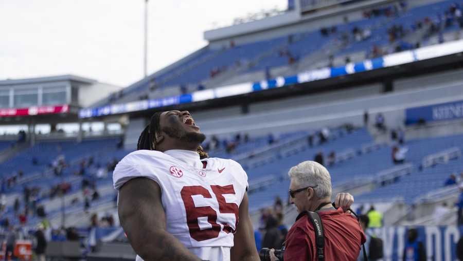 Alabama offensive lineman JC Latham (65) yells walking off the field after an NCAA college football game in Lexington, Ky., Saturday, Nov. 11, 2023. (AP Photo/Michelle Haas Hutchins)