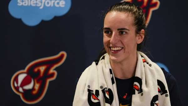 Indiana Fever guard Caitlin Clark speaks with the media after the WNBA basketball team practiced in Indianapolis, Sunday, April 28, 2024. (AP Photo/Michael Conroy)