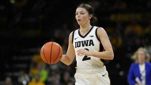 Iowa guard Taylor McCabe drives up court during the second half of an NCAA college basketball game against Drake, Sunday, Nov. 19, 2023, in Iowa City, Iowa. Iowa won 113-90. (AP Photo/Charlie Neibergall)