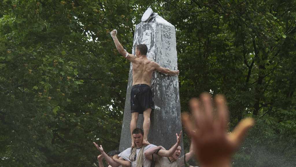 A first-year U.S. Naval Academy student has stood victorious on classmates' shoulders and placed an upperclassman's cap atop the Herndon Monument after a grueling, slippery struggle - Vimarsana News