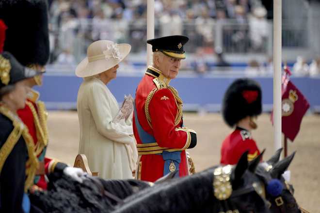 Britain&amp;apos&#x3B;s&#x20;King&#x20;Charles&#x20;III&#x20;and&#x20;Queen&#x20;Camilla&#x20;during&#x20;the&#x20;Trooping&#x20;the&#x20;Color&#x20;ceremony&#x20;at&#x20;Horse&#x20;Guards&#x20;Parade,&#x20;London,&#x20;Saturday,&#x20;June&#x20;15,&#x20;2024.&#x20;Trooping&#x20;the&#x20;Color&#x20;is&#x20;the&#x20;King&amp;apos&#x3B;s&#x20;Birthday&#x20;Parade&#x20;and&#x20;one&#x20;of&#x20;the&#x20;nation&amp;apos&#x3B;s&#x20;most&#x20;impressive&#x20;and&#x20;iconic&#x20;annual&#x20;events&#x20;attended&#x20;by&#x20;almost&#x20;every&#x20;member&#x20;of&#x20;the&#x20;Royal&#x20;Family.&#x20;&#x28;Yui&#x20;Mok&#x2F;PA&#x20;via&#x20;AP&#x29;