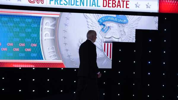 President Joe Biden walks from the stage during a break in a presidential debate with Republican presidential candidate former President Donald Trump Thursday, June 27, 2024, in Atlanta.