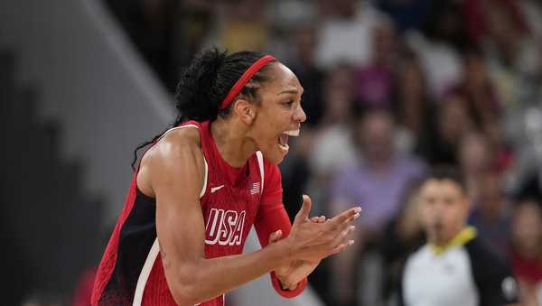 A'ja Wilson (9), of the United States, celebrates in a women's basketball game against Germany at the 2024 Summer Olympics, Sunday, Aug. 4, 2024, in Villeneuve-d'Ascq, France.