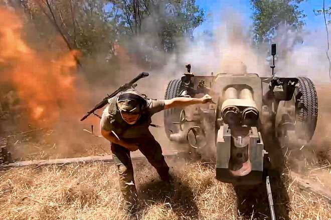 In&#x20;this&#x20;photo&#x20;taken&#x20;from&#x20;a&#x20;video&#x20;released&#x20;by&#x20;the&#x20;Russian&#x20;Defense&#x20;Ministry&#x20;on&#x20;Thursday,&#x20;Aug.&#x20;22,&#x20;2024,&#x20;a&#x20;Russian&#x20;soldier&#x20;fires&#x20;from&#x20;D-30&#x20;howitzer&#x20;towards&#x20;Ukrainian&#x20;positions&#x20;in&#x20;an&#x20;undisclosed&#x20;location&#x20;in&#x20;Ukraine.&#x20;&#x28;Russian&#x20;Defense&#x20;Ministry&#x20;Press&#x20;Service&#x20;via&#x20;AP&#x29;