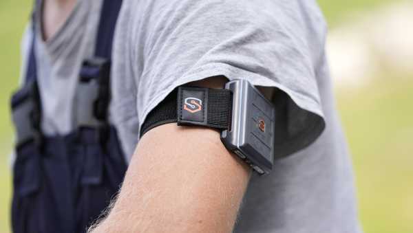 A SlateSafety armband is worn by Wyatt Fischer, a furnace mason employee at Cardinal Glass, Thursday, Aug. 22, 2024, in Menomonie, Wis. (AP Photo/Abbie Parr)