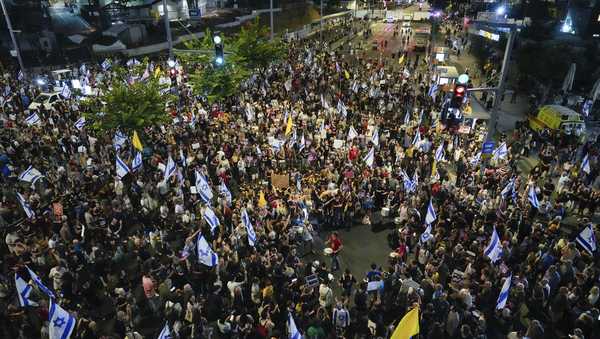 People attend a rally demanding a cease-fire deal and the immediate release of hostages held by Hamas in the Gaza Strip in Tel Aviv, Israel, on Tuesday, Sept. 3, 2024.