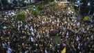 People attend a rally demanding a cease-fire deal and the immediate release of hostages held by Hamas in the Gaza Strip in Tel Aviv, Israel, on Tuesday, Sept. 3, 2024.