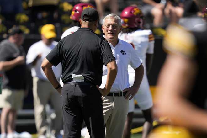Iowa&#x20;head&#x20;coach&#x20;Kirk&#x20;Ferentz,&#x20;right,&#x20;talks&#x20;with&#x20;Iowa&#x20;State&#x20;head&#x20;coach&#x20;Matt&#x20;Campbell&#x20;before&#x20;an&#x20;NCAA&#x20;college&#x20;football&#x20;game,&#x20;Saturday,&#x20;Sept.&#x20;7,&#x20;2024,&#x20;in&#x20;Iowa&#x20;City,&#x20;Iowa.&#x20;&#x28;AP&#x20;Photo&#x2F;Charlie&#x20;Neibergall&#x29;