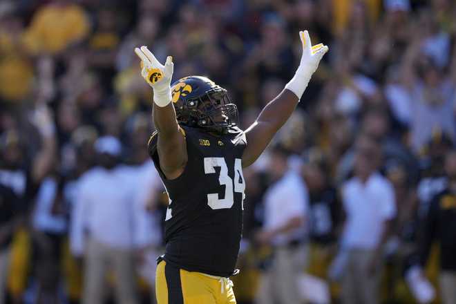 Iowa&#x20;linebacker&#x20;Jay&#x20;Higgins&#x20;&#x28;34&#x29;&#x20;celebrates&#x20;a&#x20;missed&#x20;Iowa&#x20;State&#x20;field&#x20;goal&#x20;during&#x20;the&#x20;first&#x20;half&#x20;of&#x20;an&#x20;NCAA&#x20;college&#x20;football&#x20;game,&#x20;Saturday,&#x20;Sept.&#x20;7,&#x20;2024,&#x20;in&#x20;Iowa&#x20;City,&#x20;Iowa.&#x20;&#x28;AP&#x20;Photo&#x2F;Charlie&#x20;Neibergall&#x29;