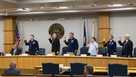 Coast Guard members of the investigative board for the Titan marine board formal hearing take an oath inside the Charleston County Council Chambers Monday, Sept. 16, 2024, in North Charleston, S.C. 