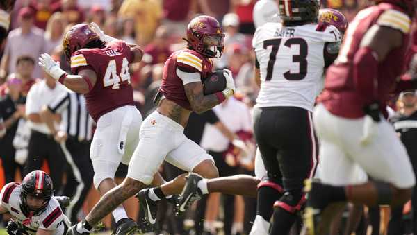 Iowa State defensive back Malik Verdon, center, runs up field after intercepting a pass during the first half of an NCAA college football game Arkansas State, Saturday, Sept. 21, 2024, in Ames, Iowa. (AP Photo/Charlie Neibergall)