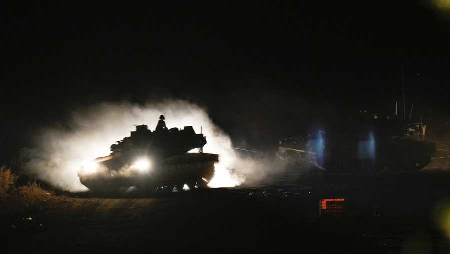 An Israeli tank manoeuvres in northern Israel near the Israel-Lebanon border, Monday, Sept. 30, 2024. (AP Photo/Baz Ratner)