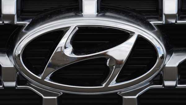 FILE - The Hyundai company logo is displayed Sept. 12, 2021, in Littleton, Colo.   (AP Photo/David Zalubowski, File)